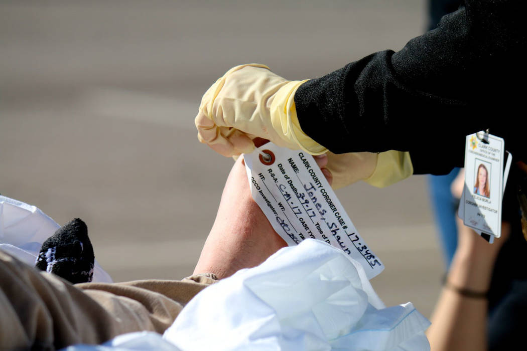 Laura Hubel/Boulder City Review
Clark County coroner's office places a toe tag on Boulder City High School student Shaun Jones, who "died" at the scene of a drunk driving crash as part of the scho ...