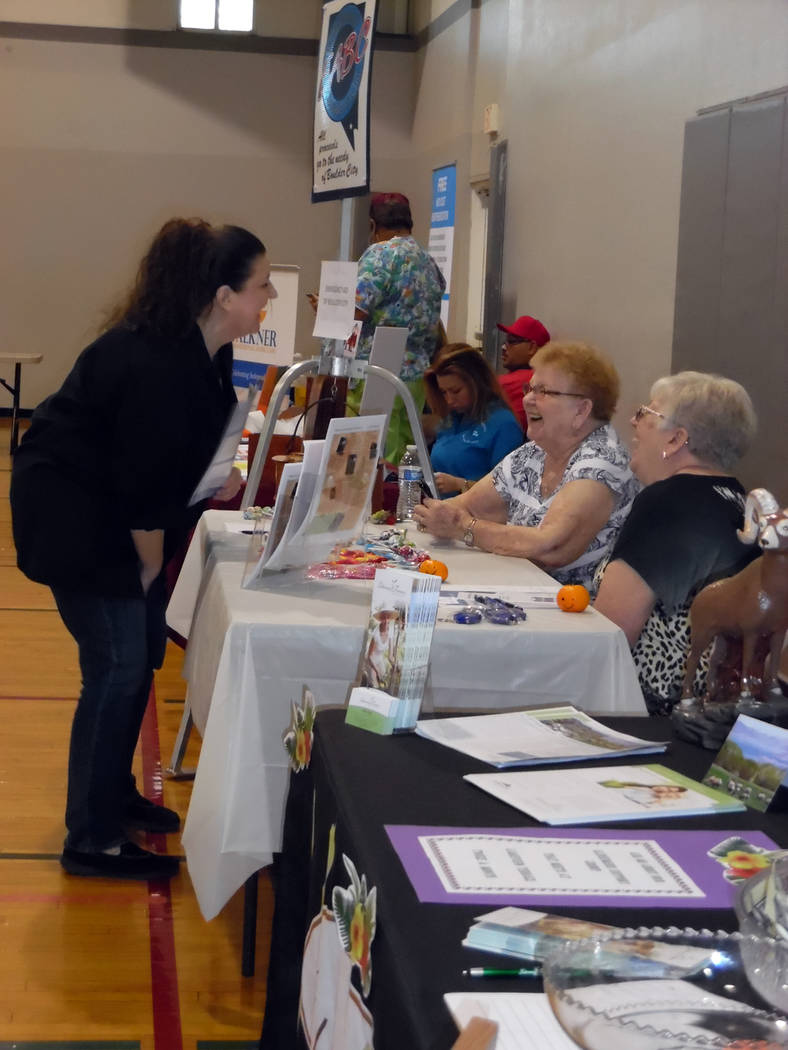 Hali Bernstein Saylor/Boulder City Review
Shannon Eckman, left, the new program director for Lend A Hand of Boulder City, visits with exhibitors during the nonprofit's second annual caregivers fai ...