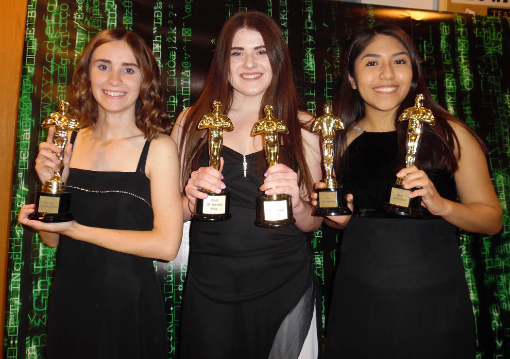Hali Bernstein Saylor/Boulder City Review
Josephine Lucas, from left, Jessica Smith and Denis Victorina show off the trophies Lucas and Smith won during the fifth annual Boulder City Movie Awards  ...