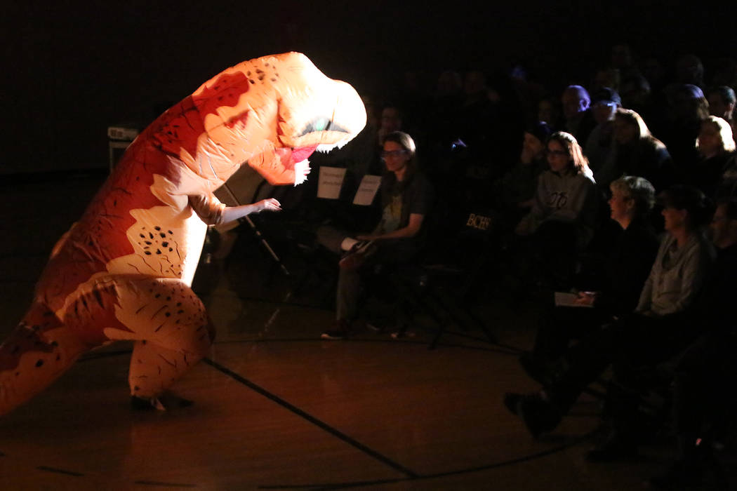 BCHS Publications
Jayme Sileo, who presented the award for best sound, enters the fifth annual Boulder City Movie Awards at Boulder City High School dressed as a Tyrannasaurus Rex from &quot;J ...