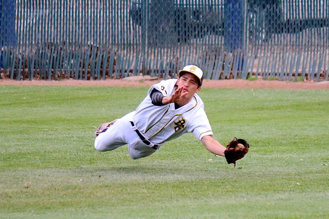 Laura Hubel/Boulder City Review
A diving play in deep right field by Boulder City High School senior John Oliver ended the inning against Southeast Career Technical Academy during the Eagles' 6-2  ...