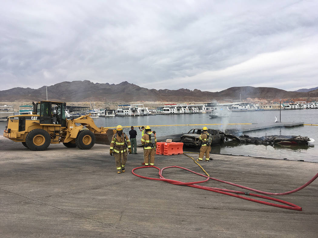 National Park Service
The courtesy dock adjacent to the launch ramp at Callville Bay at Lake Mead National Recreation Area sustained some damaged after a truck, boat and trailer were destroyed in  ...