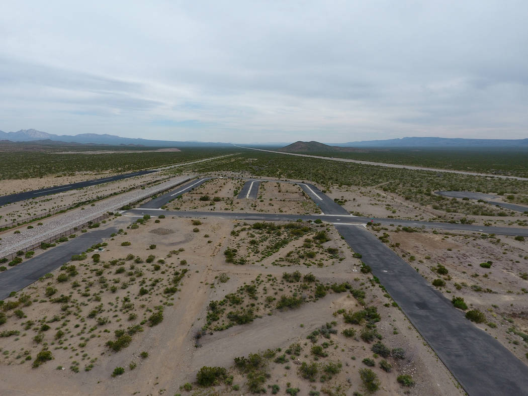 Michael Quine/Las Vegas Review-Journal @Vegas88s
This aerial view shows the Searchlight airport, where Jonathan Daniels, founder of Praxis Aerospace Concepts International, plans to open a drone t ...