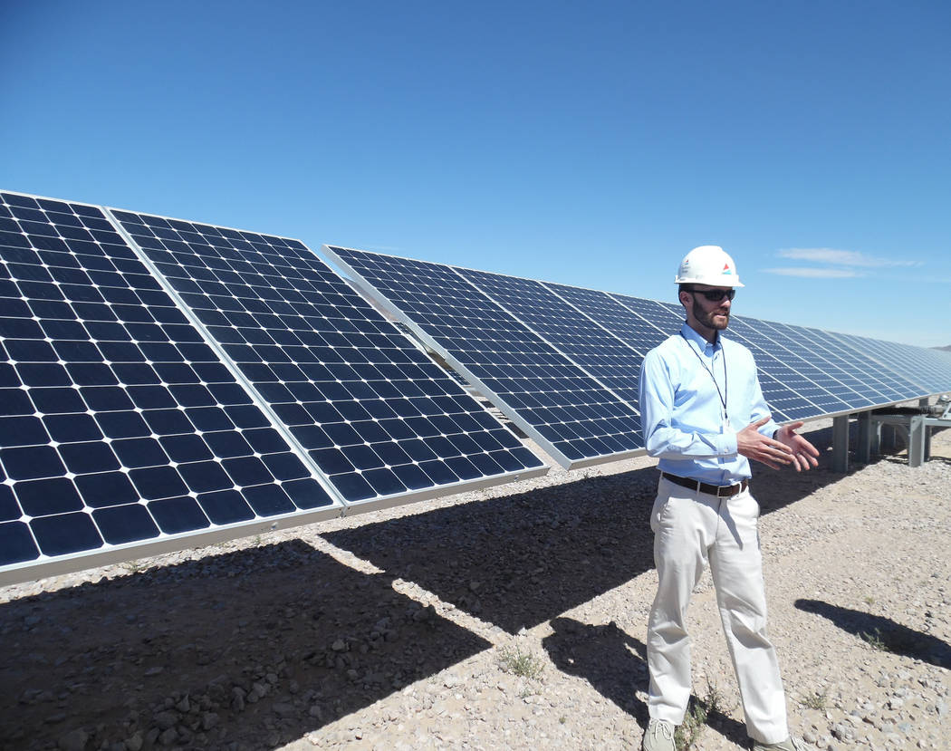 Hali Bernstein Saylor/Boulder City Review
Andew deRussy, an engineer with Southern Power's engineering and maintenance team, explains how energy is generated on each module on the solar panel duri ...