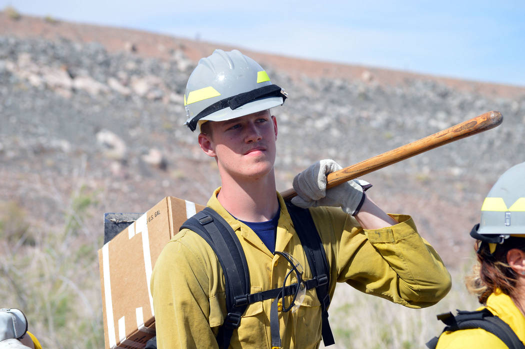 Celia Shortt Goodyear/Boulder City Review
Zack Child waits with his crew to start putting is firefighting skills into practice at Lake Mead National Recreation Area on April 27. The event was part ...