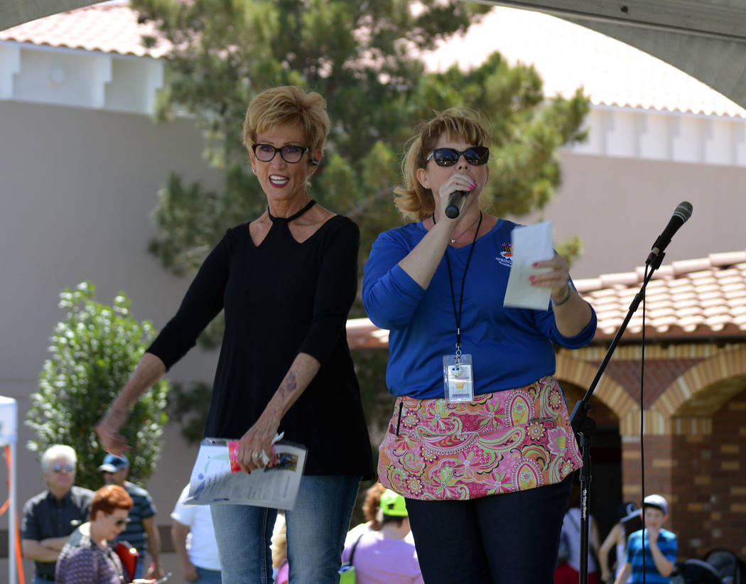 Celia Shortt Goodyear/Boulder City Review
Jill Rowland-Lagan, right, CEO of the Boulder City Chamber of Commerce, presents a check for $500 on behalf of the Boulder Police Protection to Cokie Boot ...