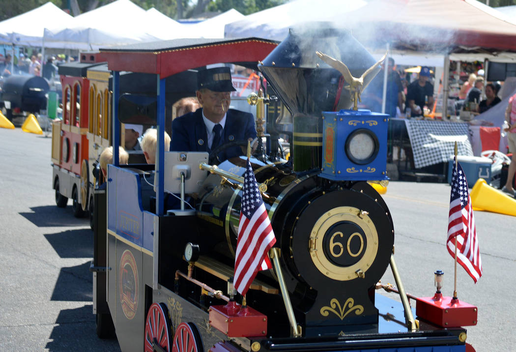 Celia Shortt Goodyear/Boulder City Review
Daryl Schelin of the Jupiter Express Railroad drives the train through the Spring Jamboree in Boulder City.
