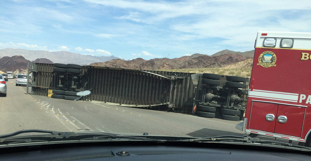 Hali Bernstein Saylor/Boulder City Review
No injuries were reported after a semitruck overturned on U.S. Highway 93 near Lakeshore Road on a windy Friday afternoon blocking both southbound lanes o ...