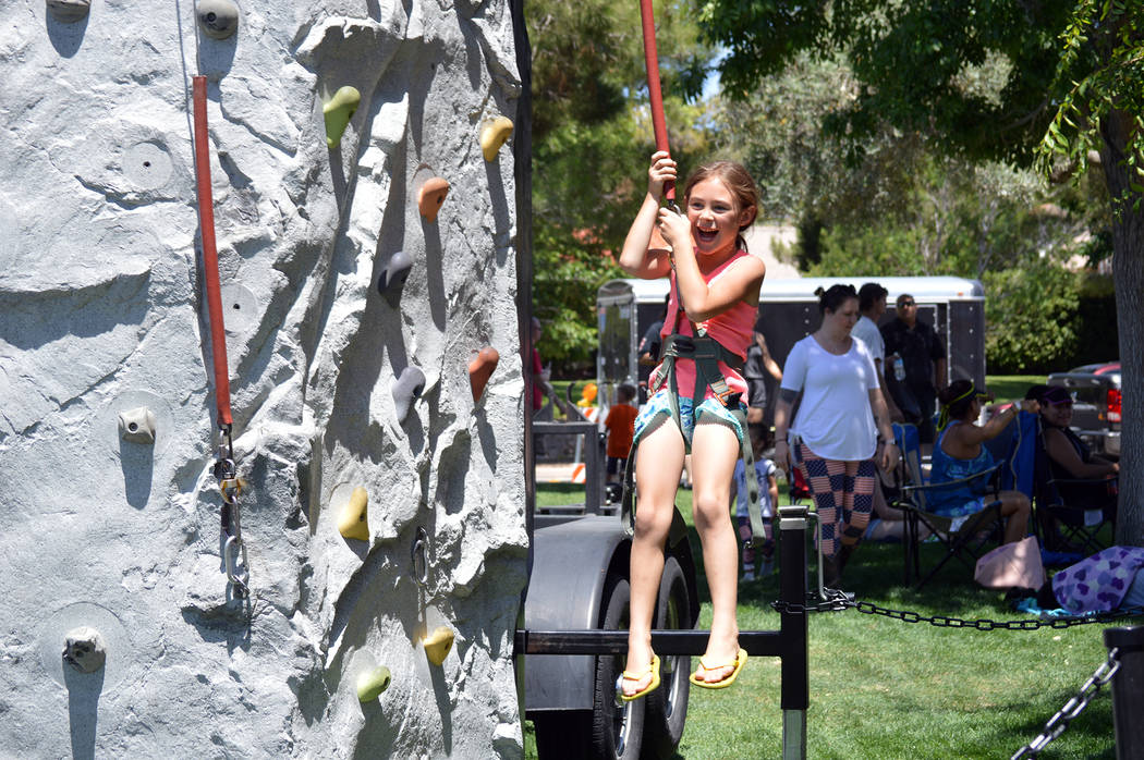 Celia Shortt Goodyear/Boulder City Review
Savannah Challis enjoys the climbing wall on Saturday.