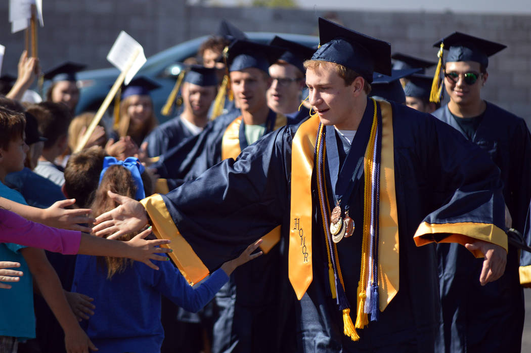 Seniors make memories, inspire youngsters with annual Grad Walk
