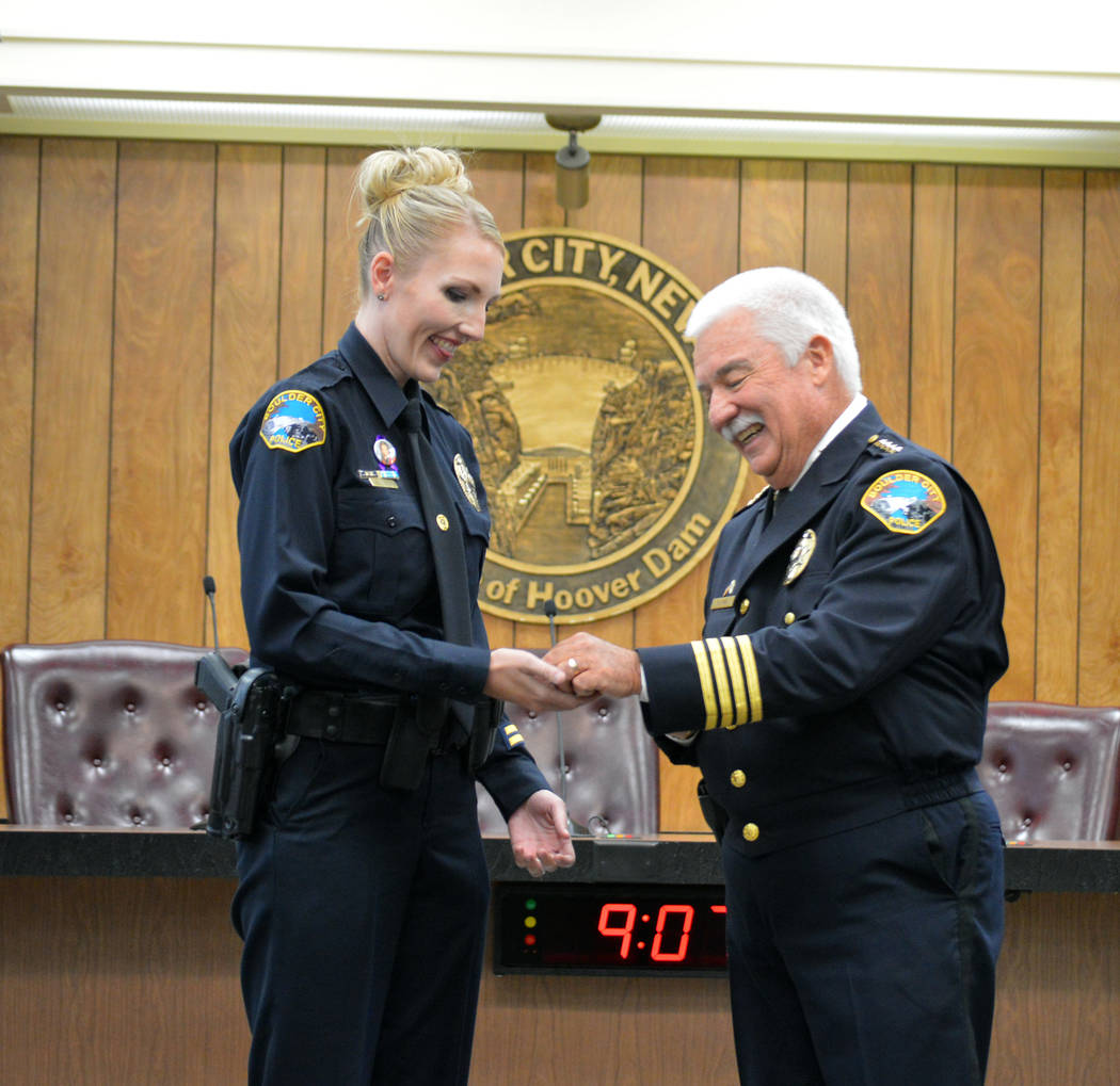 Celia Shortt Goodyear/Boulder City Review
Boulder City Police Officer Tiffany Driscoll receives the department's Life Saver Award from Police Chief Tim Shea for her actions on Feb. 11 that saved a ...