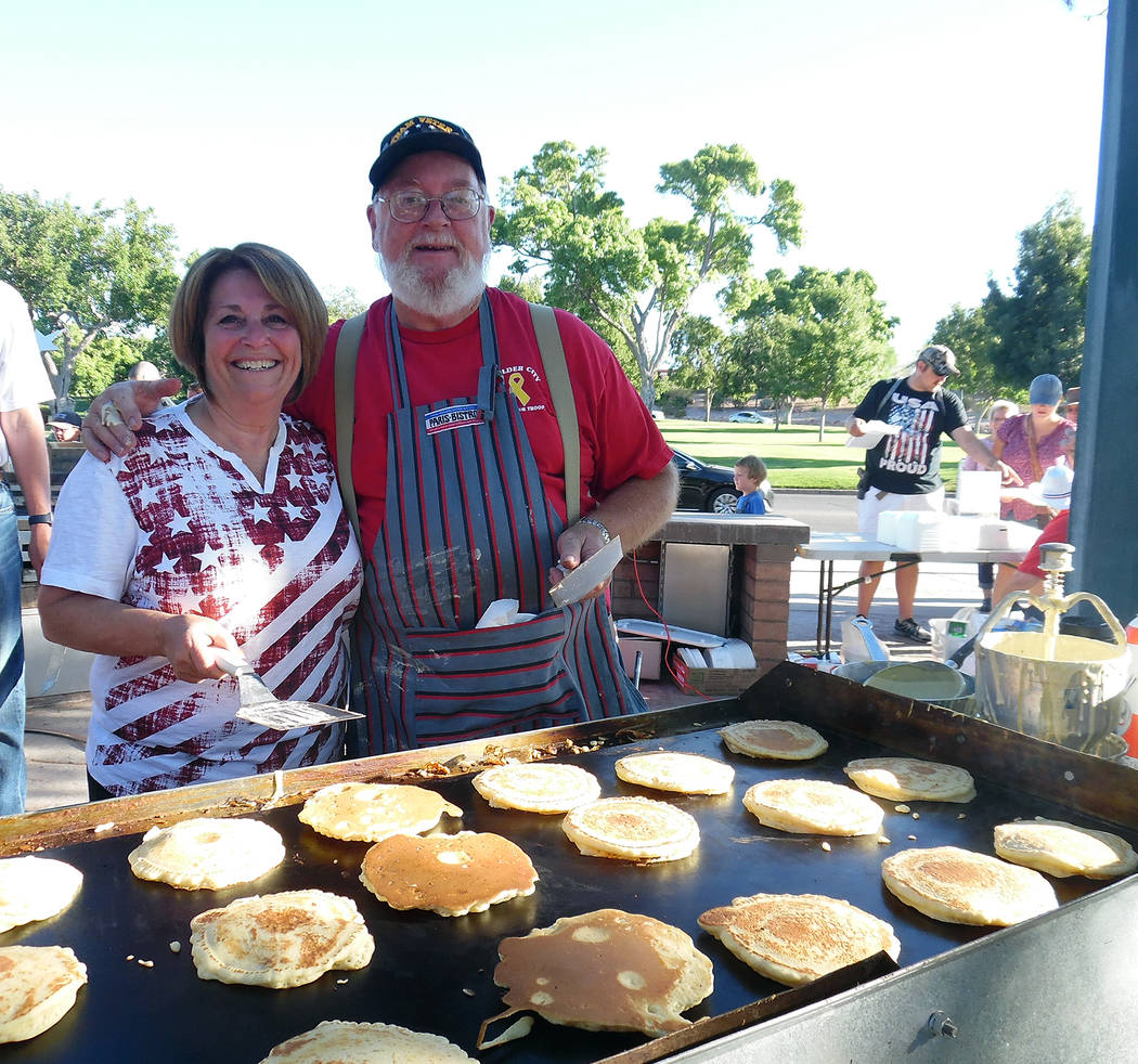 Hali Bernstein Saylor/Boulder City Review
Jeanne Donadio and Duncan McCoy of the Rotary Club of Boulder City manned the grill for Tuesday's pancake breakfast. They expected to serve at least 600 f ...