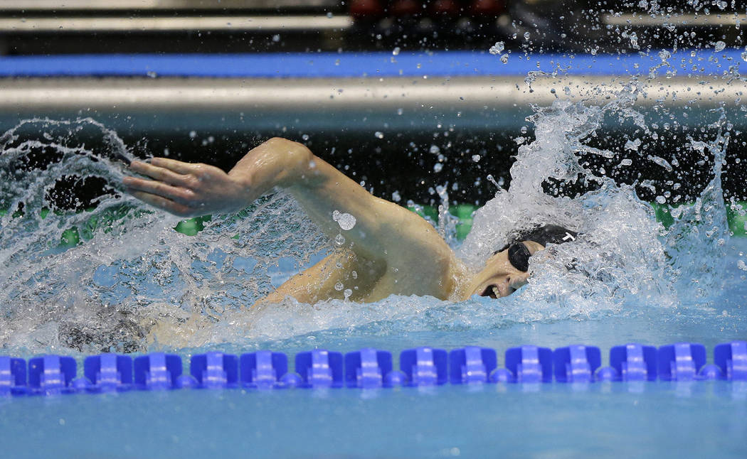 Michael Conroy/The Associated Press
Zane Grothe swims on his way to winning men's 400-meter freestyle at the U.S. swimming national championships in Indianapolis on Friday. He is a 2010 graduate o ...
