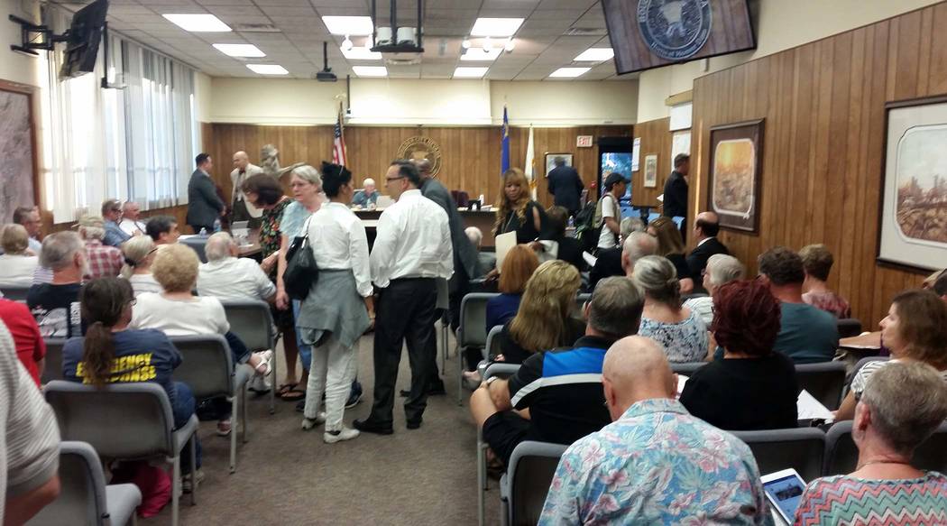 Celia Shortt Goodyear/Boulder City Review
People try to find seats in council chambers at City Hall for the packed City Council meeting Tuesday evening.