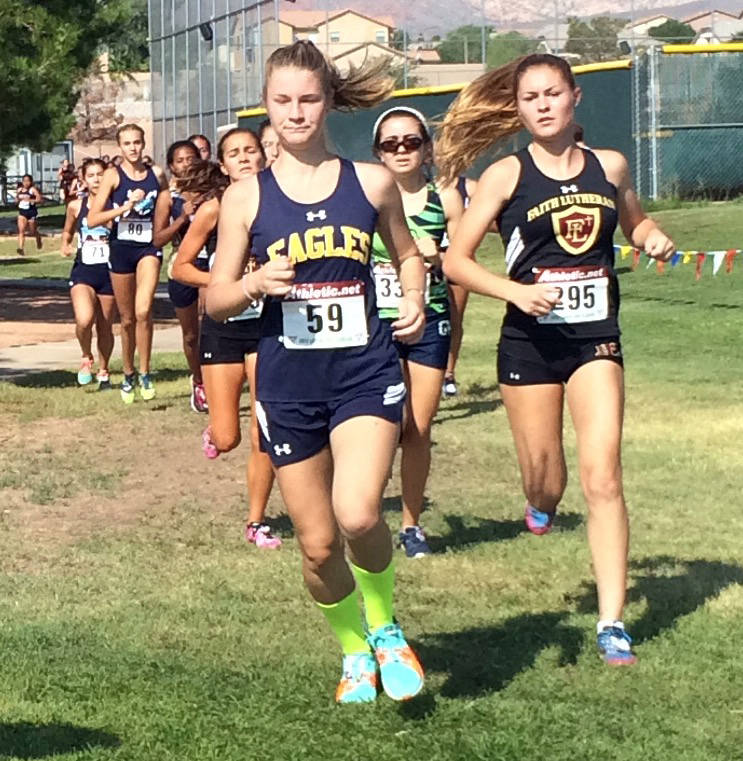 Staci Selinger
Boulder City High School senior Sierra Selinger leads a herd of runners at Palo Verde High School on Saturday, Sept. 2, 2017. Selinger finished as the second 3A competitor.