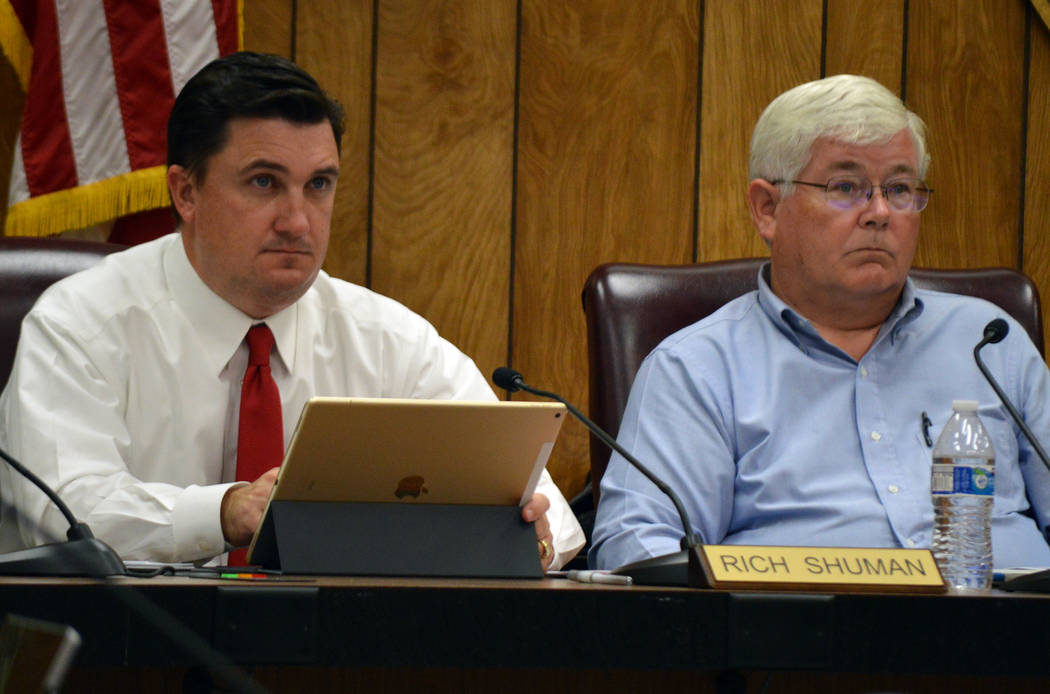 Celia Shortt Goodyear/Boulder City Review
Councilmen Rich Shuman, left, and Kiernan McManus listen to a staff presentation about the contract for the city attorney during Tuesday's meeting.
