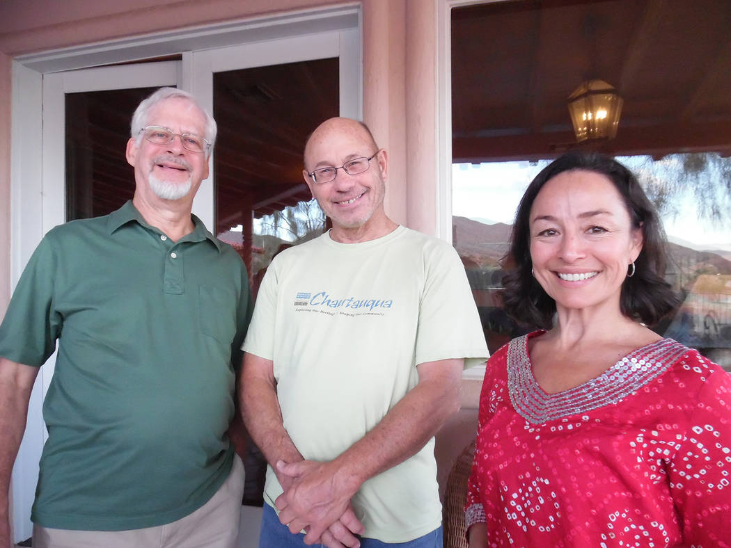 Hali Bernstein Saylor/Boulder City Review
Robert Riemer, left, and Rachel Howland visited with Chautauqua scholar Doug Mishler on Friday during a reception prior to his performance as Ernie Pyle f ...