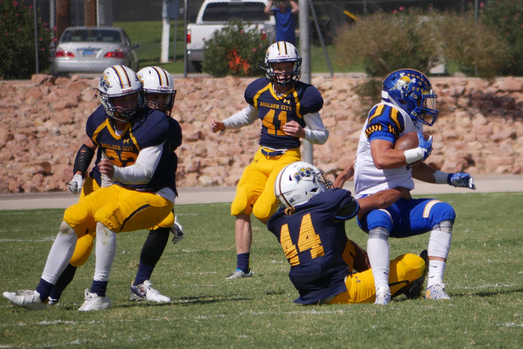 Paul Luisi/Boulder City Review
Boulder City High School junior Gino Carroll (No. 44) tackles a Moapa Valley Pirate in Saturday's 16-0 loss at home.
