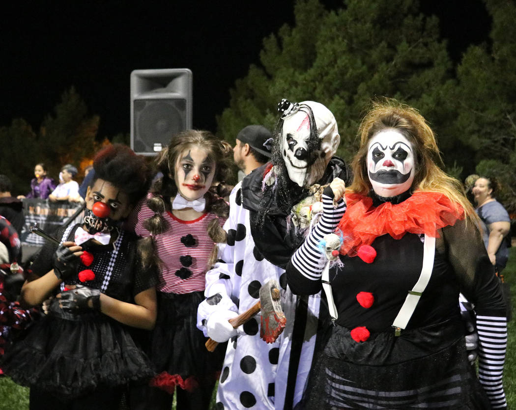 Tristin Phelps/Boulder City Review
A local family of four dressed up in came as scary clowns hoping to win the prize for the group costume contest during Saturday's Trunk or Treat celebration at V ...