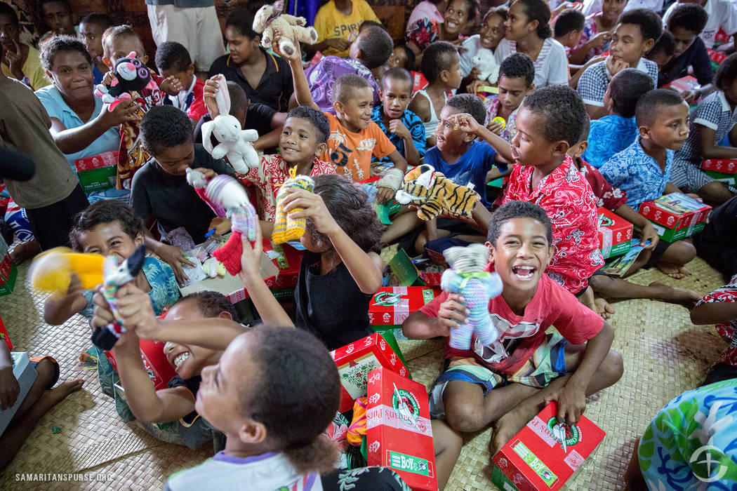 Samaritan's Purse/Operation Christmas Child
Children in Fiji open their shoe boxes provided by Operation Christmas Child.