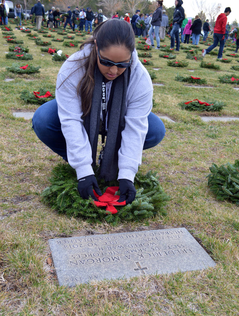 Celia Shortt Goodyear/Boulder City Review
Amanda Cotalano straightens a wreath at the grave of World War II veteran Frederick Morgan as part of Wreaths Across America on Saturday.