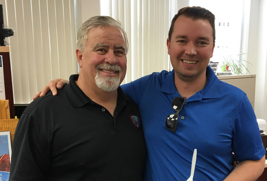 Boulder City
Jacob Andersen, right, who left his position as the citys aquatic coordinator to move to Minnesota to be near family, shares a farewell moment with Roger Hall, director of the Parks a ...