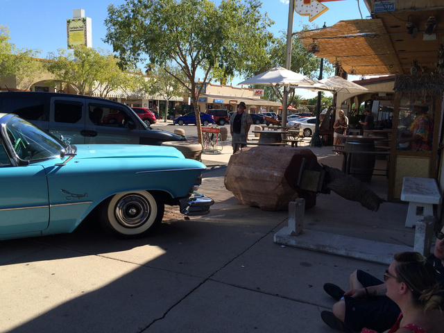 Hali Bernstein Saylor/Boulder City Review
A restored 1957 Chrysler Imperial sits on the side walk on Nevada Way after the driver crashed into the "Monumental Professor" sculpture Saturday. The cra ...