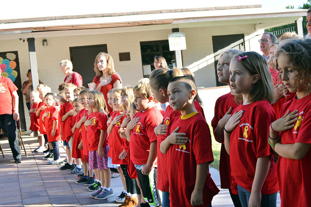 Max Lancaster/Boulder City Review
Julian Vargas, 6, fourth from right, and the other students of Grace Christian Academy hold their hands over their hearts during the Pledge of Allegiance. The stu ...