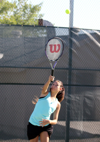 Robert Vendettoli/Boulder City Review
Senior Kyra Yamamoto gets set to serve her doubles partner McKena Frazier during a practice session Tuesday at Boulder City High School.