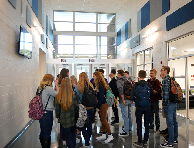Max Lancaster/Boulder City Review 
Boulder City High School students mingle and admire the new school building at the ribbon cutting ceremony on Tuesday. Seniors and teachers were more nostalgic f ...