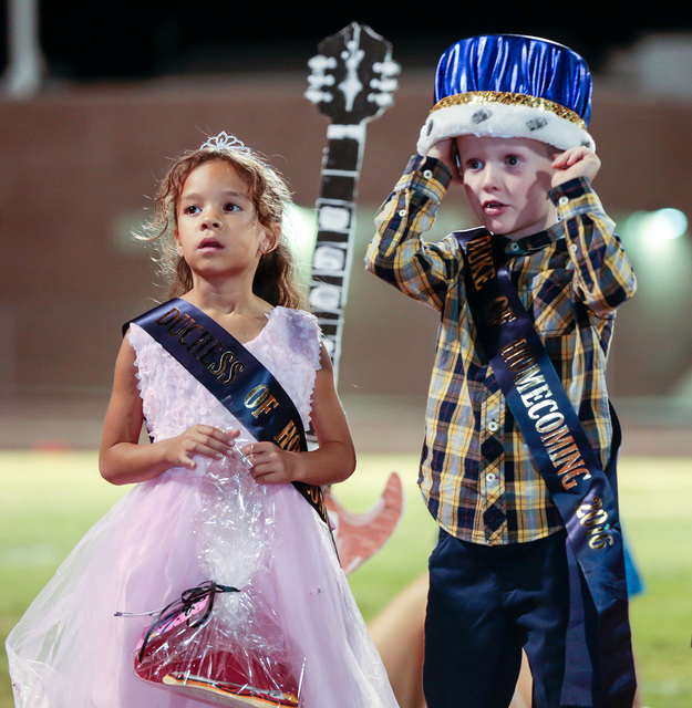 Donavon Lockett/Boulder City Review
Homecoming court duchess Lana Attridge and duke Kolbe Boyle, kindergartners from Mitchell Elementary School, stand before the crowd after being announced at the ...