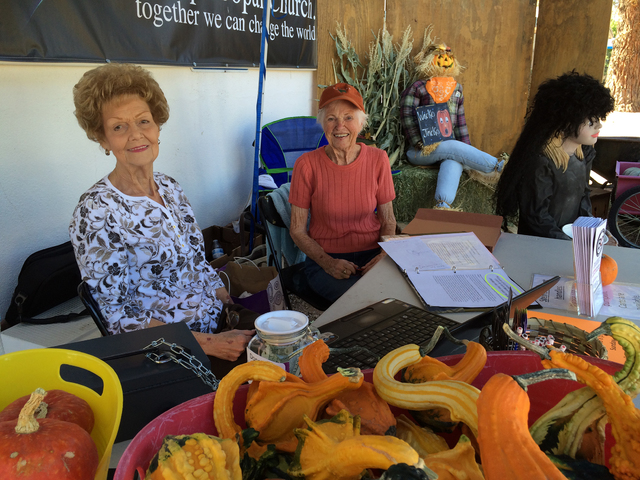Hali Bernstein Saylor/Boulder City Review
Nancy Seymore, left, and Kris Matuska, members of Boulder City United Methodist Church, were ready to help people pick their pumpkins at the church's pump ...