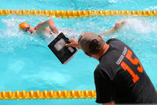 File photo
Desert Storm head coach Bill Carroll paces Abby Sauerbrei in the women’s 800-meter freestyle during the Los Angeles Invite at the University of Southern California in July. She signed ...