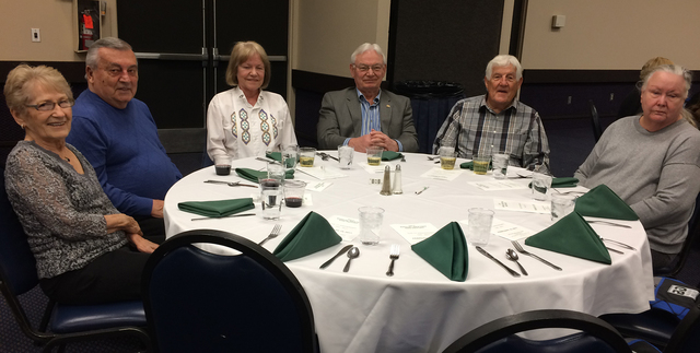 Hali Bernstein Saylor/Boulder City Review
Waiting for dinner to be served before the start of Boulder Dam Credit Union's annual meeting Feb. 15 at the Henderson Convention Center were, from left,  ...