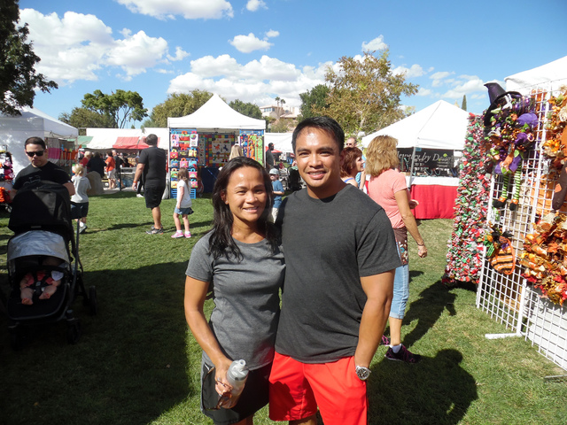 Hunter Terry/Boulder City Review
Cindy and John Bacani of Henderson said they loved the diverse artwork and all of the food options at the 54th annual Art in the Park on Saturday in downtown Bould ...