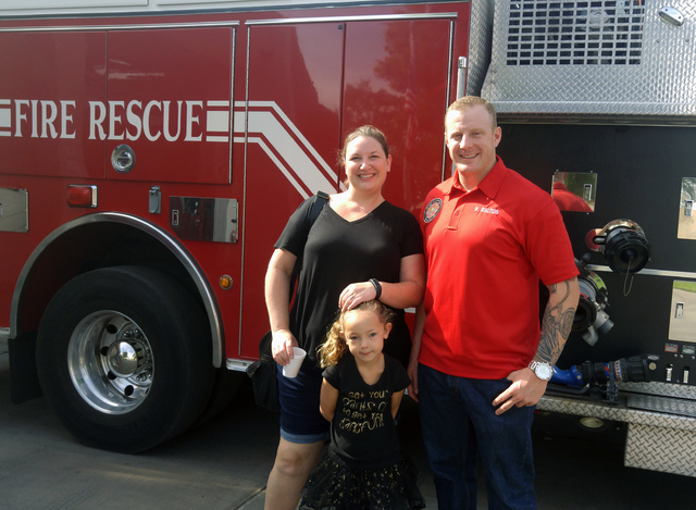 Hunter Terry/Boulder City Review
Rosalind Ripley and her 4-year-old daughter, Sienna, of Henderson enjoyed a tour of the fire department and the fire engines from Boulder City Firefighter Josh Bar ...