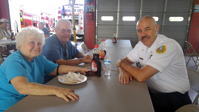 Hunter Terry/Boulder City Review
Dorothy and Jack Rants chat with Division Chief of Operations Chuck Gebhart about the great people at the fire department and the Rants' 82 years in Boulder City d ...