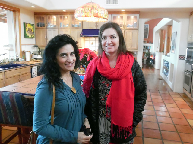 Hunter Terry/Boulder City Review
Rimi Marwah, left, of Las Vegas and Alyson Pyles of Richland, Washington, were excited to see the decked out homes on the American Association of University Women' ...