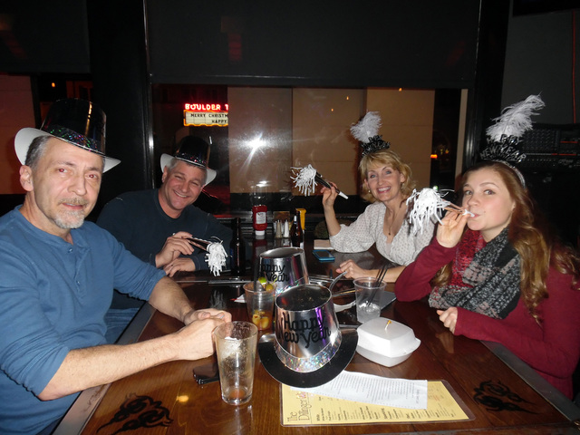 Hunter Terry/Boulder City Review
Steve Pickner, from left, along with Larry, Kelly and Whitney Weinheimer, all of Henderson, were excited to ring in the new year Saturday night at The Dillinger Fo ...