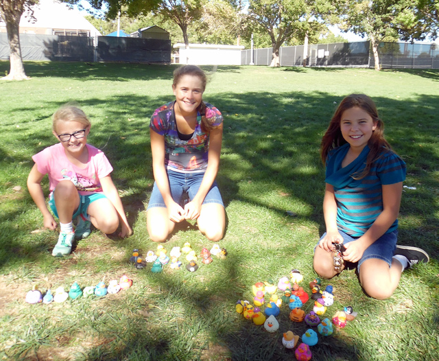 Hunter Terry/Boulder City Review
Emily Traasdahl, 8, from left, Olivia Mikkelson, 14, and Lillian Mikkelson, 10, took home a bounty of aquatic prizes after playing games at Dr. Eldon Clothier’s  ...