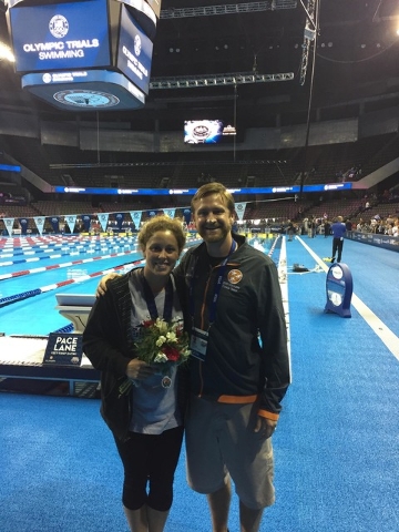 Coach Bret Lundgaard congratulates his protege Molly Hannis after the swimmer qualified for the U.S. Olympic team during trials in Omaha, Nebraska, earlier this month. Courtesy photo
