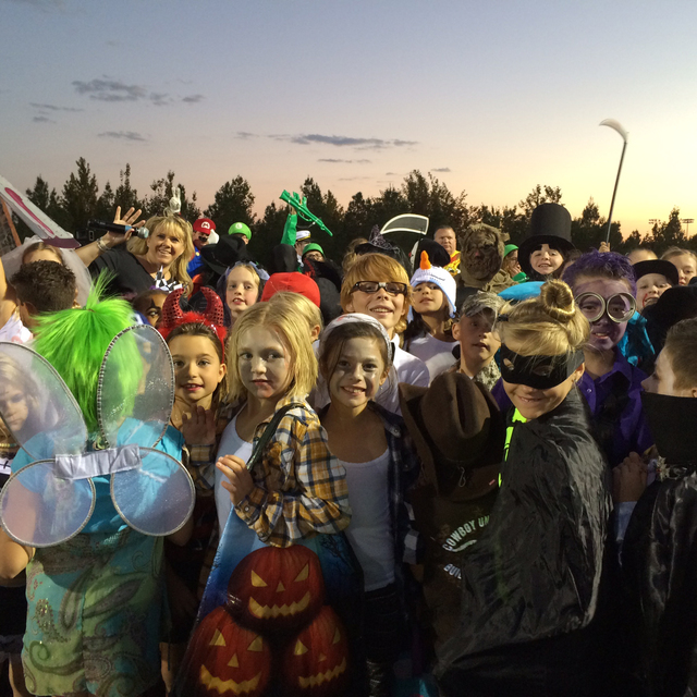 Hali Bernstein Saylor/Boulder City Review
Boulder City Chamber of Commerce CEO Jill Rowland-Lagan was surrounded by children as the costume contest got underway during Trunk or Treat festivities S ...