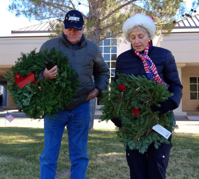 Hunter Terry/Boulder City Review
Tom and Judy Barnes volunteered to lay wreaths at the grave of veterans Saturday at the Southern Nevada Veterans Memorial Cemetery as part of the Wreaths Across Am ...
