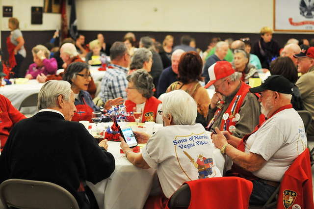 Brian Sandford/View
An attendee's Sons of Norway Vegas Viking T-shirt is seen in the foreground during the early lutefisk dinner Jan. 28 at Boulder City Elks Lodge.