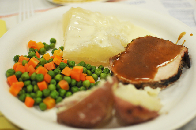 Brian Sandford/View
Lutefisk, at the rear of the plate, was served with roasted pork, boiled potatoes and peas and carrots during the Vegas Viking's lutefisk dinner Saturday at Boulder City Elks L ...