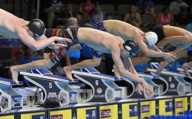 Zane Grothe, center, seen during the preliminary heat of the men's 400-meter freestyle at the U.S. Olympic swimming trials in Omaha, Nebraska in June, set a U.S. Open meet record Aug. 6 with a tim ...