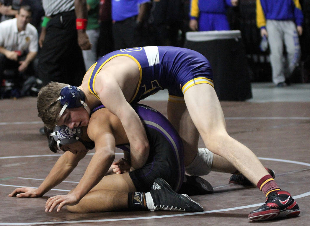 Rich Viera
Boulder City High School sophomore Ladd Cox, seen wrestling at the state championships Friday, Feb. 9, 2018, at The Orleans, was eventually pinned by his opponent in the in 145-pound we ...