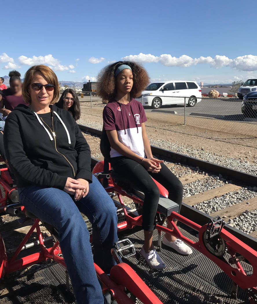 Hali Bernstein Saylor/Boulder City Review
St. Jude's Ranch for Children youth care specialist Tina Bellerose, left, and Dallas Tanner, 13, get ready to pedal a rail car as Rail Explorers hosted ar ...