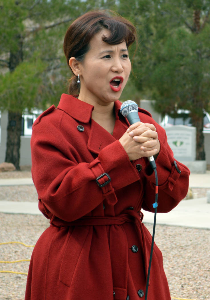 Celia Shortt Goodyear/Boulder City Review
Eun Hee Kim sings the Korean national anthem Saturday during the dedication for a new Korean War memorial at the Southern Nevada Veterans Memorial Cemeter ...