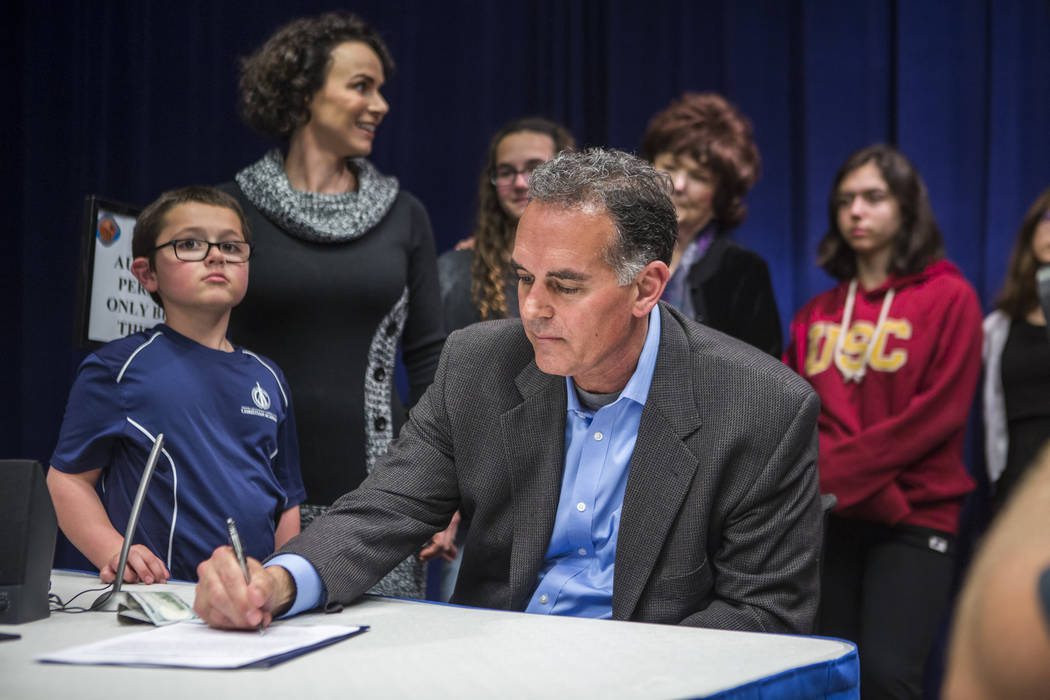 Patrick Connolly/Las Vegas Review-Journal
Danny Tarkanian files for his candidacy for the 3rd Congressional District of Nevada with his wife Amy, their four children and Las Vegas City Councilwoma ...